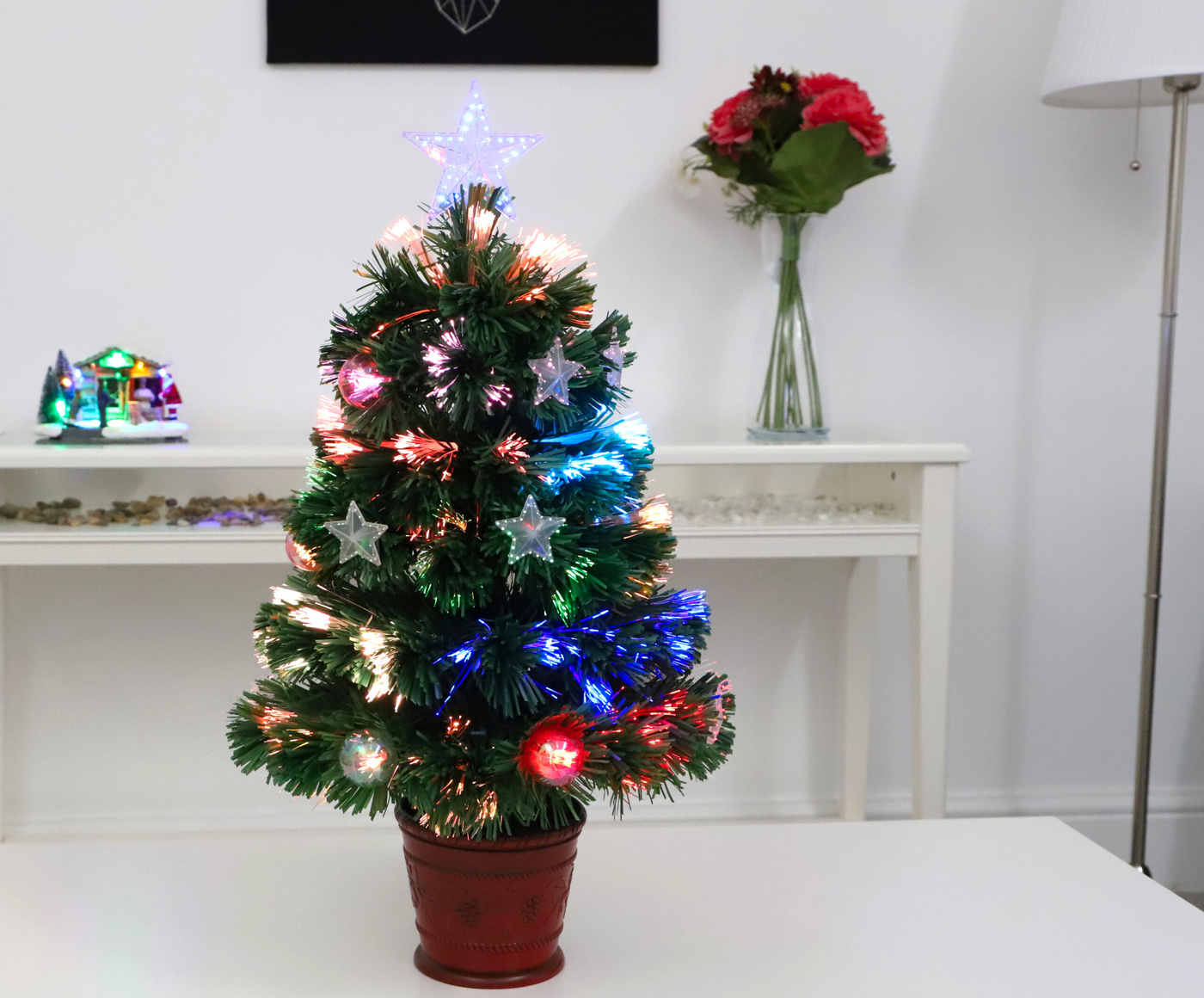 Christmas Concepts 2FT 60CM GREEN FIBRE OPTIC CHRISTMAS TREE WITH STARS AND BAUBLES AND RED BASE